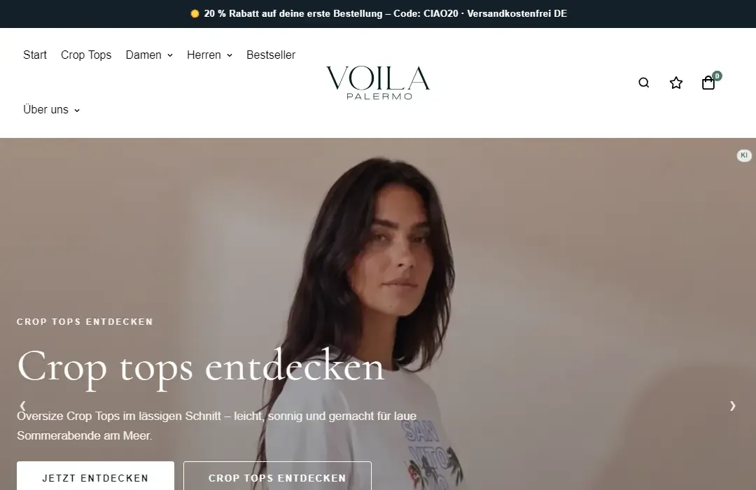 الصفحة الرئيسية لمتجر Voilà Palermo الإلكتروني: عارضة ترتدي كروب توب أبيض، وعنوان «اكتشفوا الكروب توب»